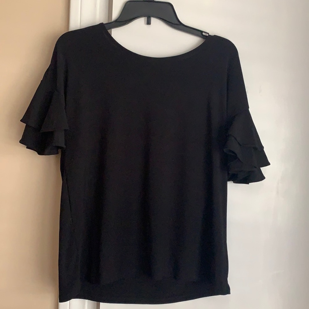 Classic black top with a flare!
